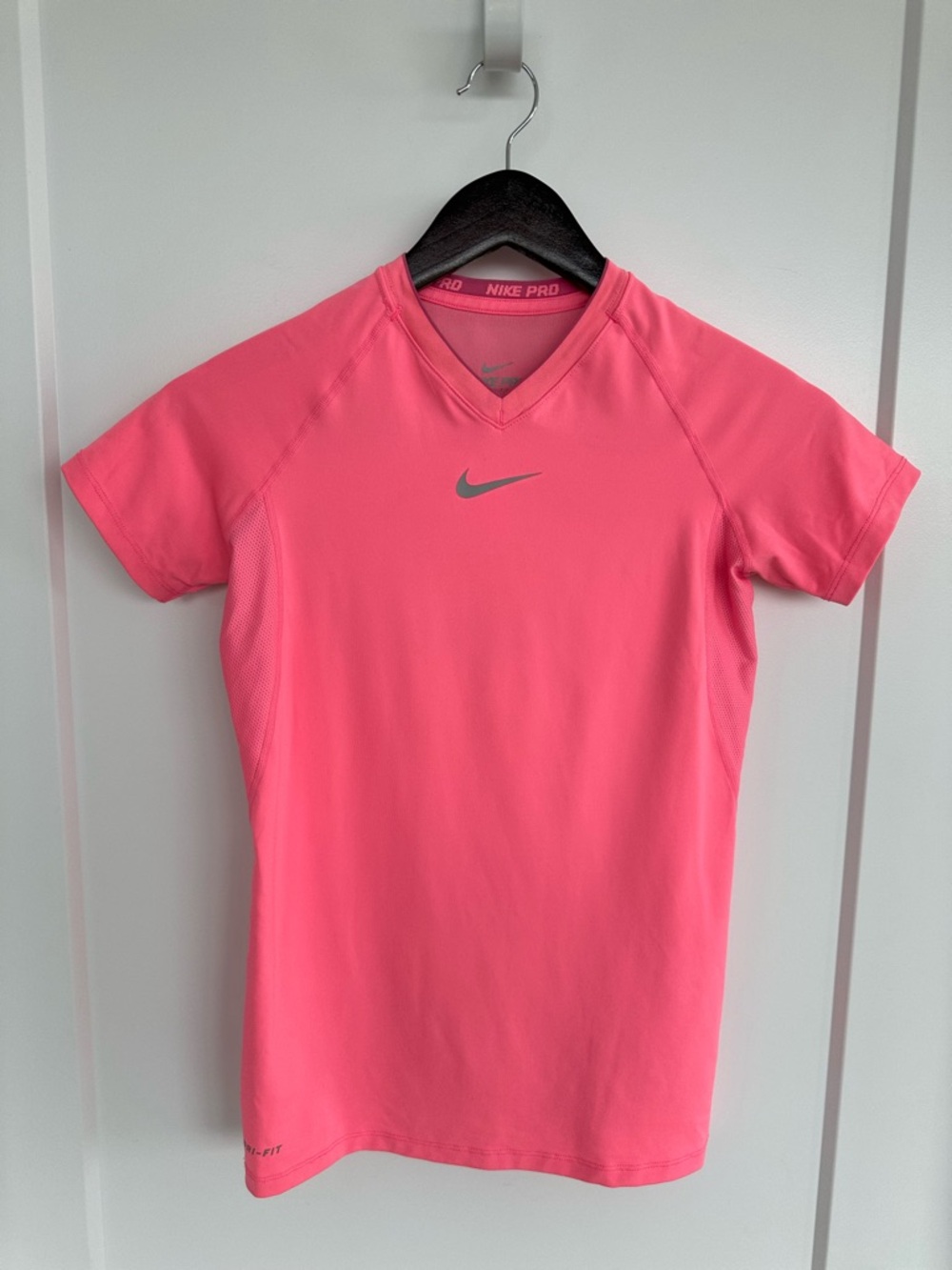 Girl’s Nike Pink V-Neck Athletic Top with Silver Swoosh